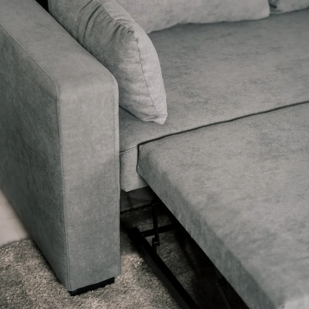 Sofá cama com chaise longue reversível e almofadas soltas