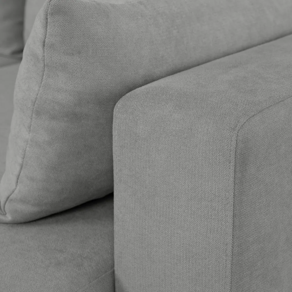 Sofá cama com chaise longue reversível e almofadas soltas